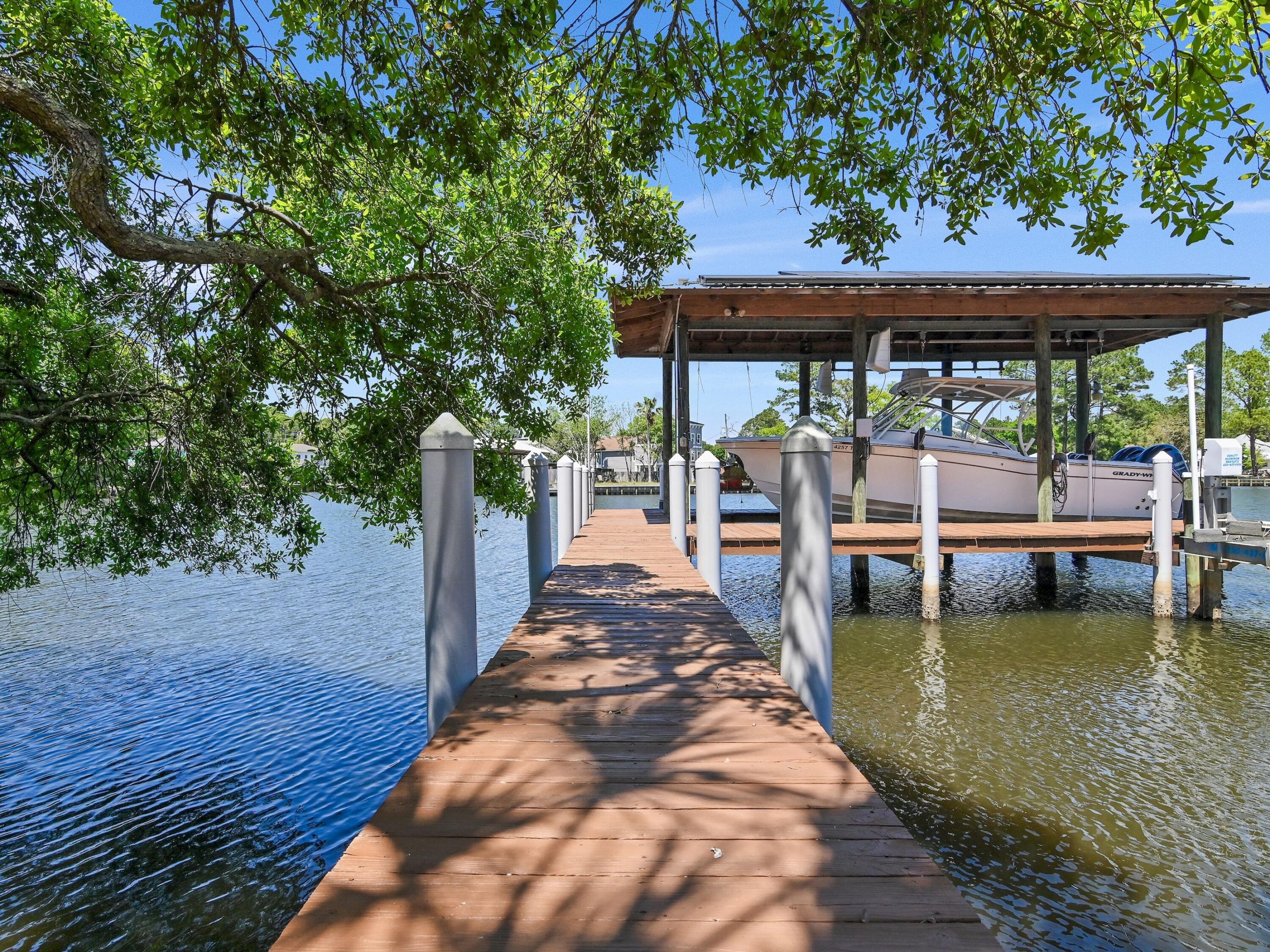 182 My Way Santa Rosa Beach, FL 32459 - Photo 33 of 39 a view of a swimming pool with a patio