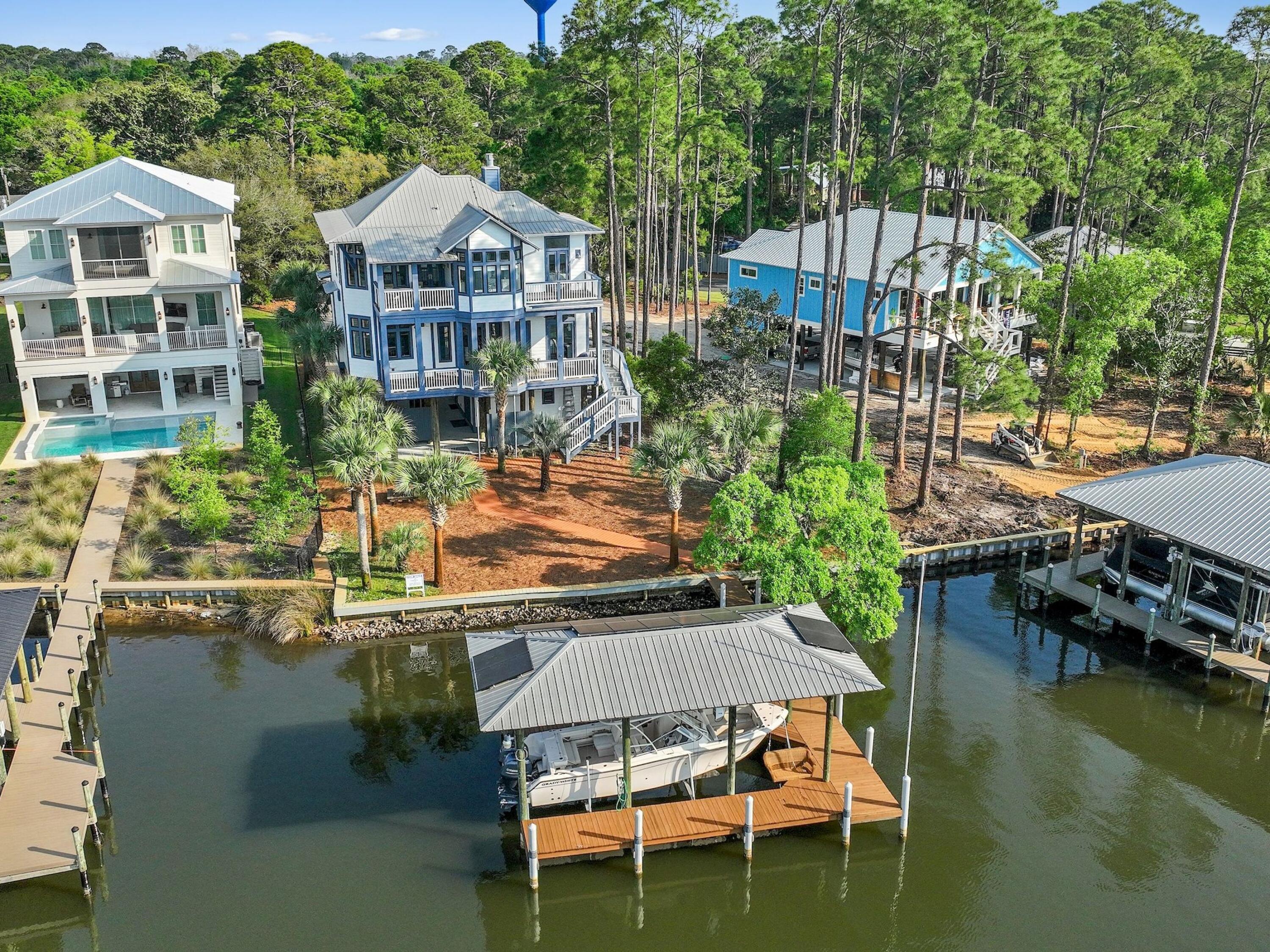 182 My Way Santa Rosa Beach, FL 32459 - Photo 37 of 39 a aerial view of a house with swimming pool and outdoor seating