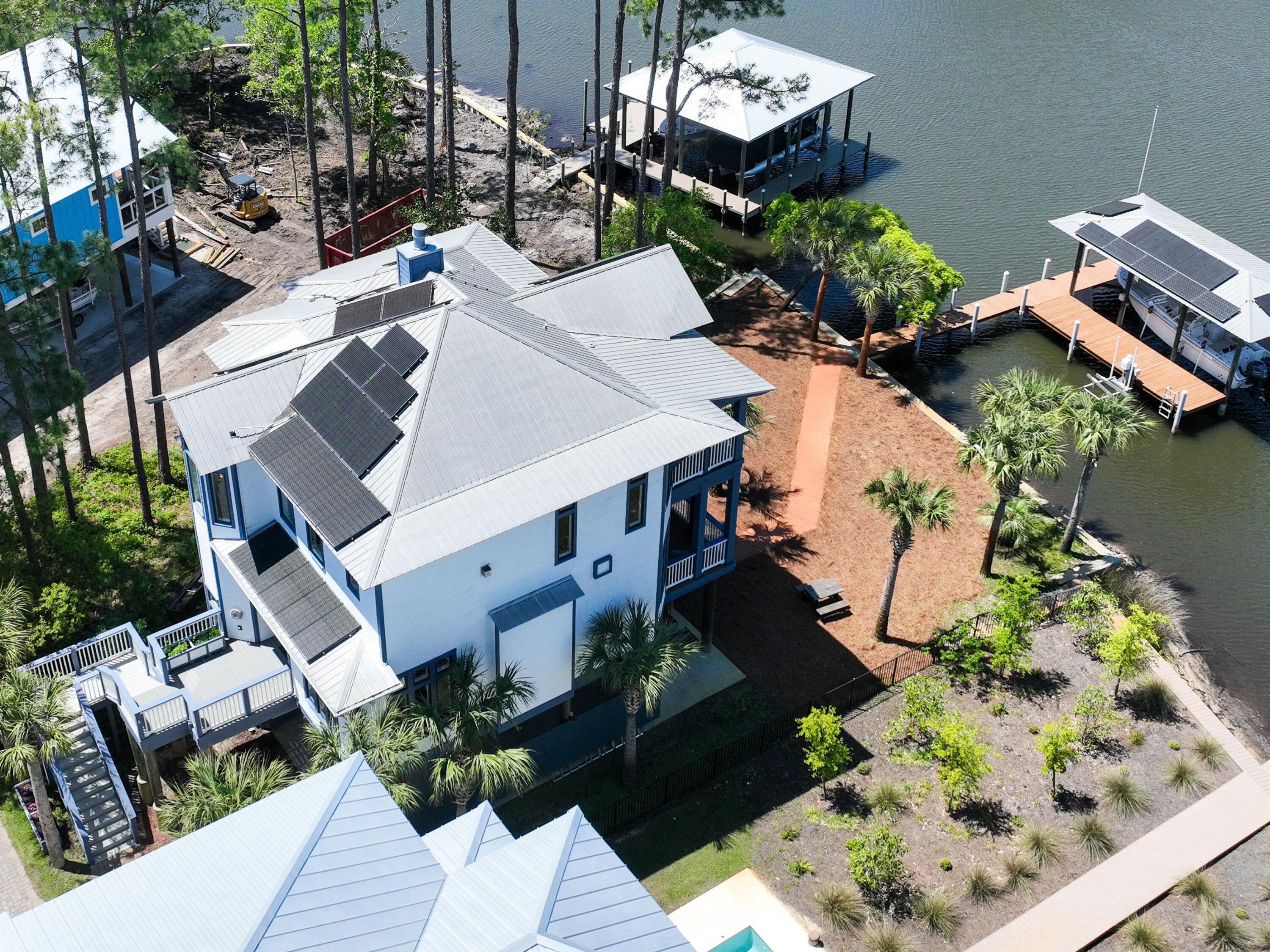 182 My Way Santa Rosa Beach, FL 32459 - Photo 4 of 39 an aerial view of a house with a yard
