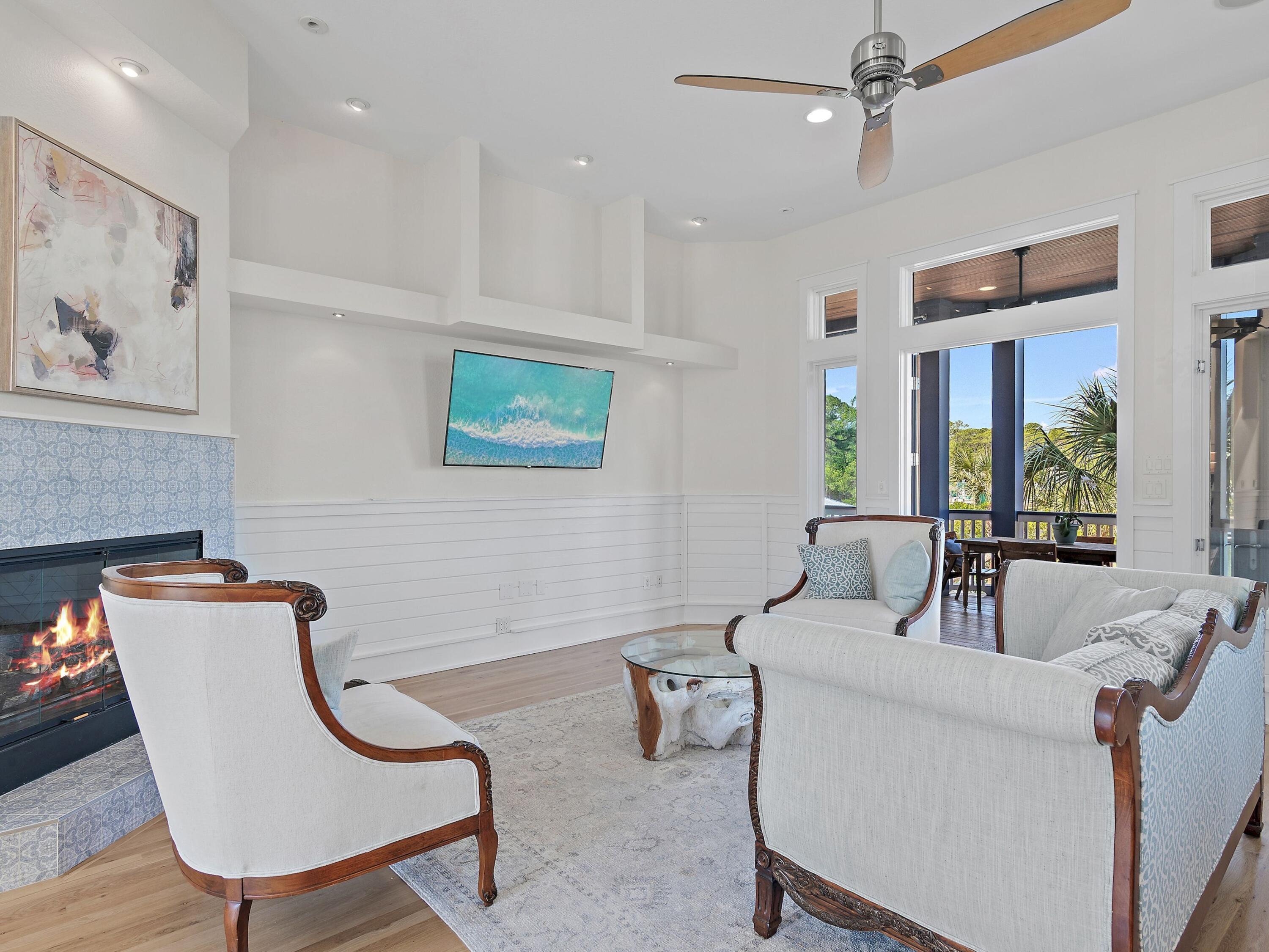 182 My Way Santa Rosa Beach, FL 32459 - Photo 7 of 39 a living room with furniture and a large window