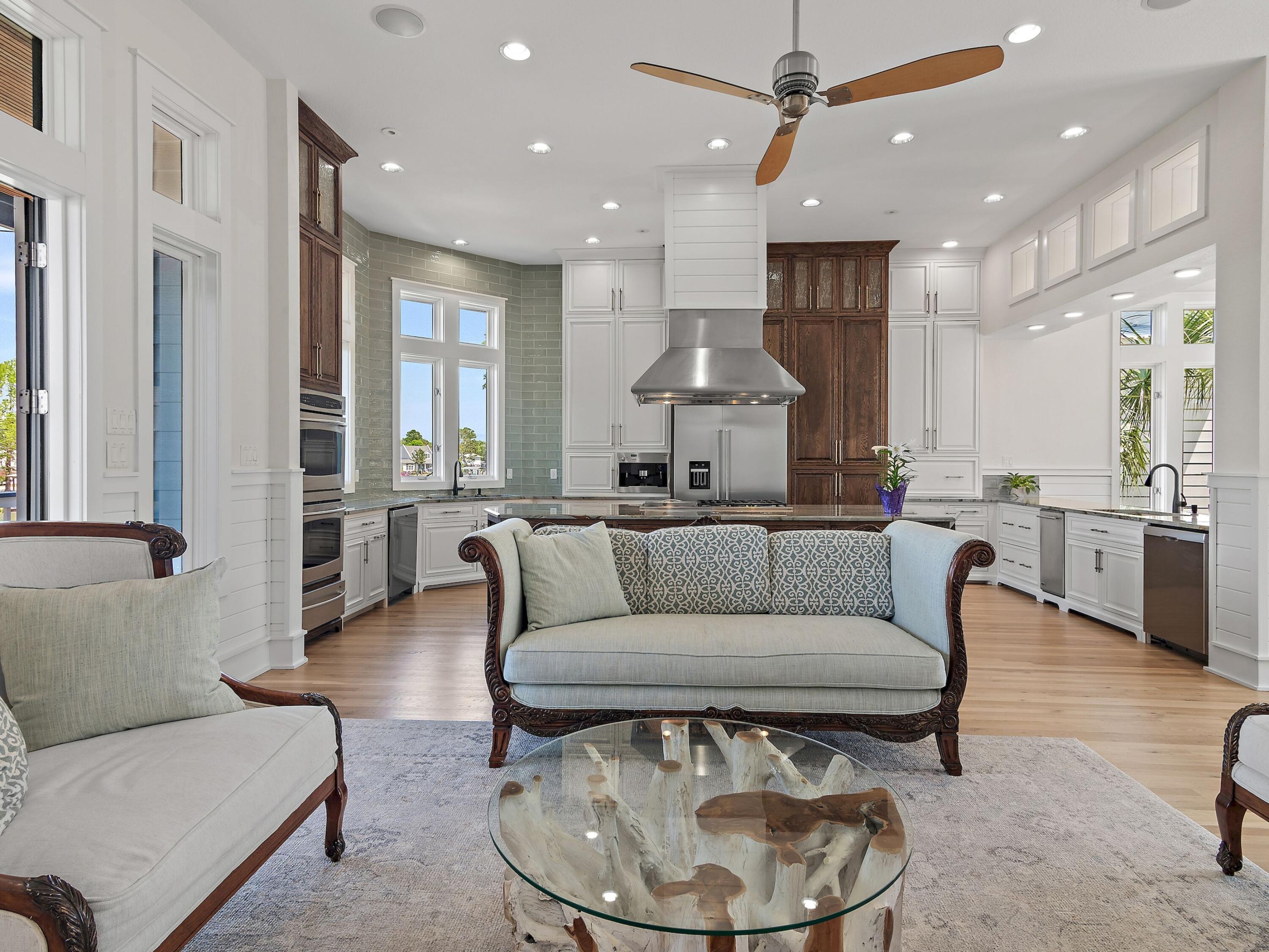 182 My Way Santa Rosa Beach, FL 32459 - Photo 9 of 39 a living room with furniture and a large window
