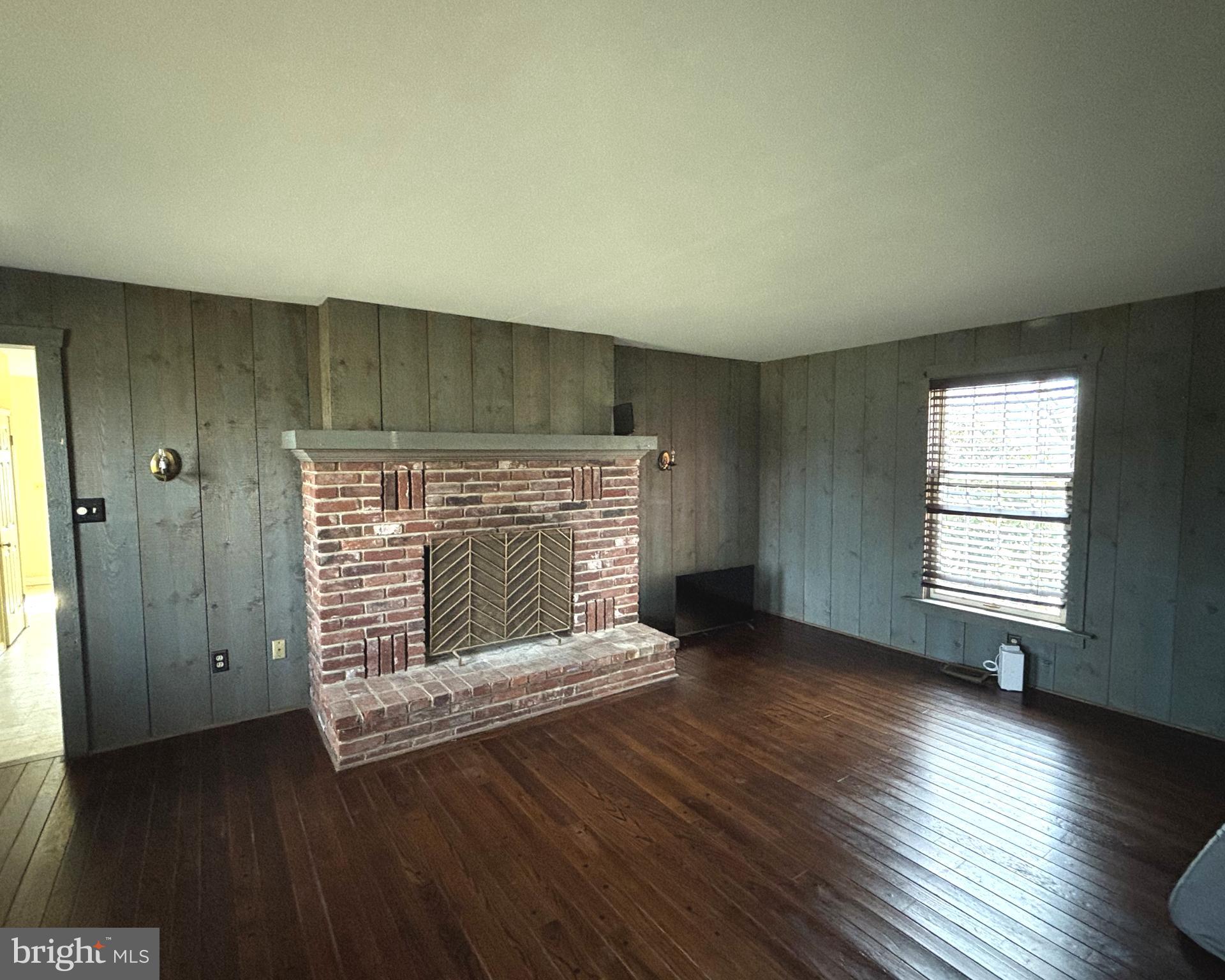 723 Godshall Road Telford, PA 18969 - Photo 12 of 31 an empty room with wooden floor and windows