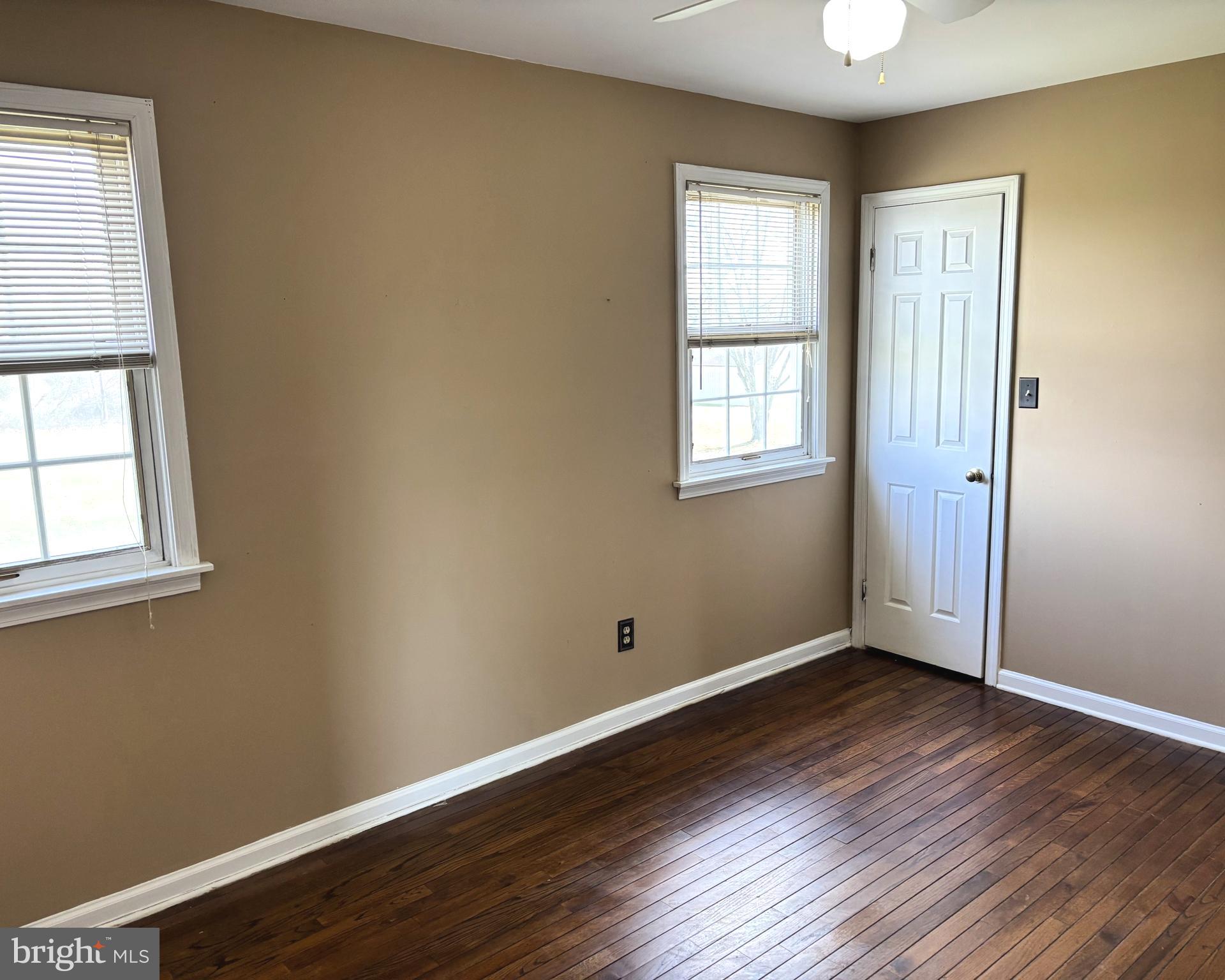 723 Godshall Road Telford, PA 18969 - Photo 23 of 31 an empty room with wooden floor and windows