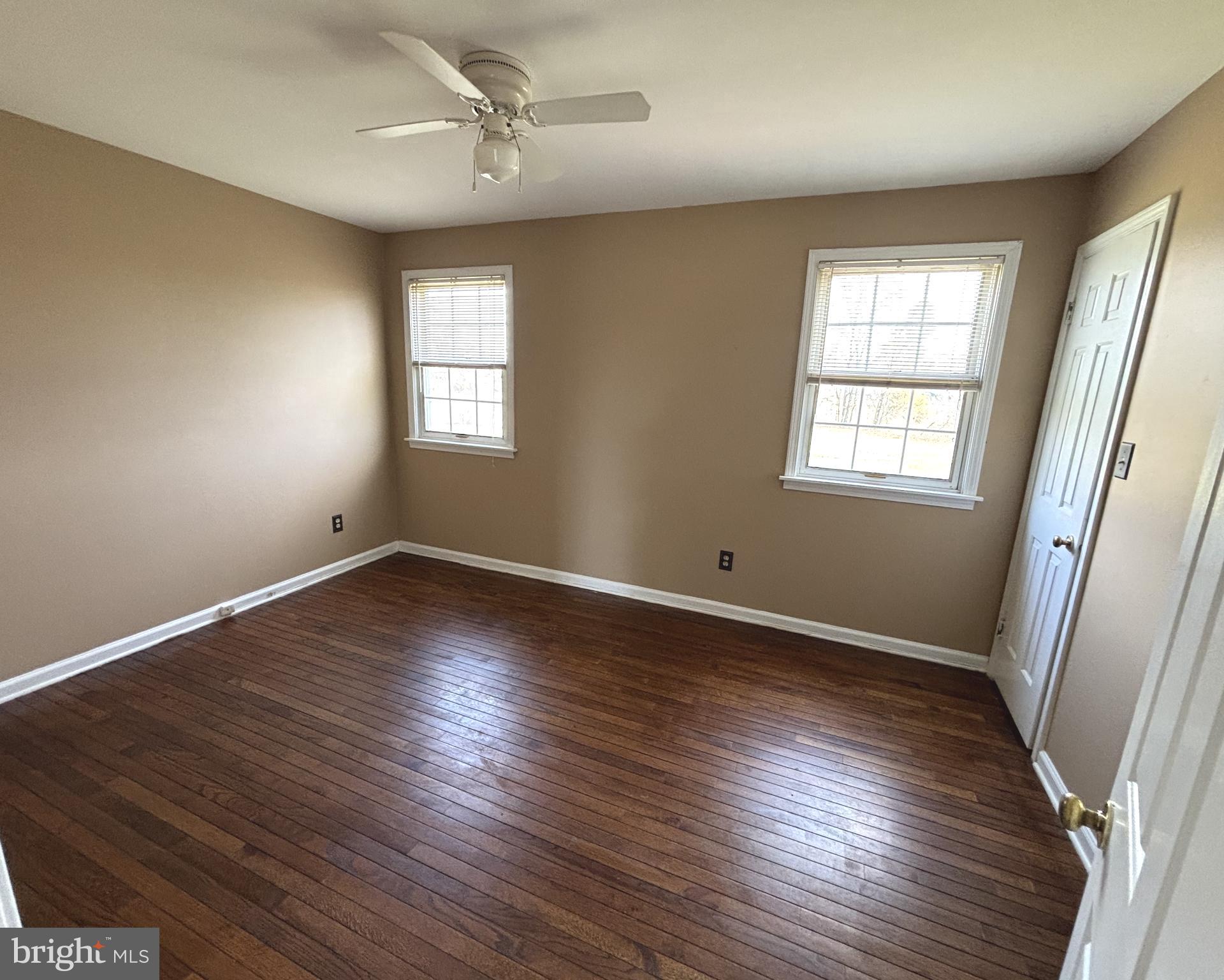 723 Godshall Road Telford, PA 18969 - Photo 25 of 31 a view of an empty room with wooden floor and a window