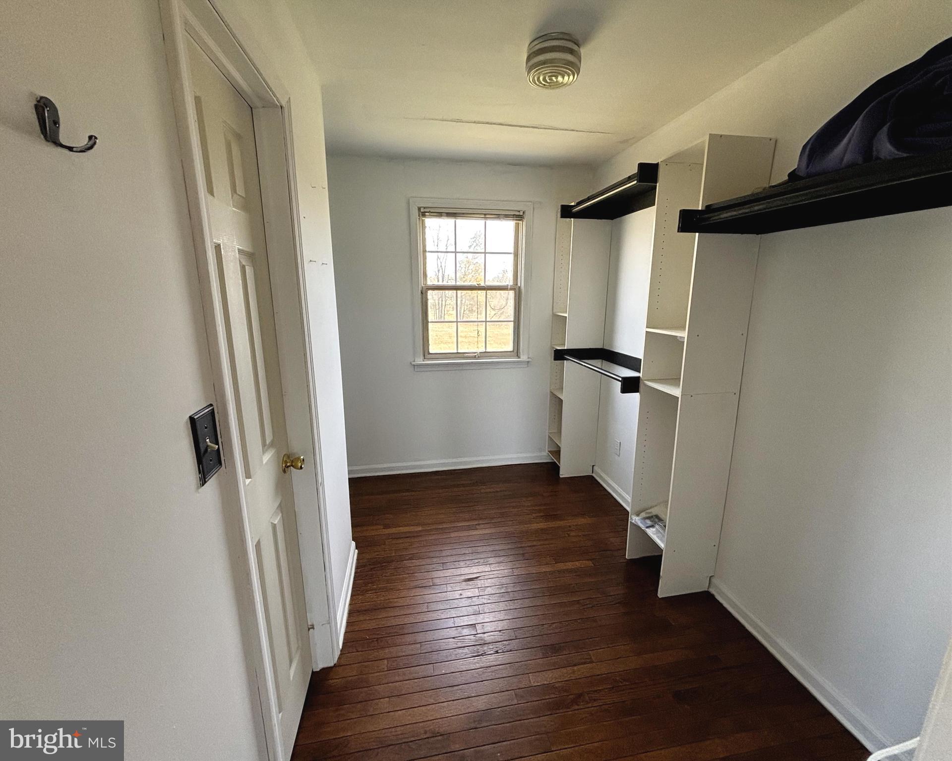 723 Godshall Road Telford, PA 18969 - Photo 27 of 31 a view of a hallway with wooden floor and staircase
