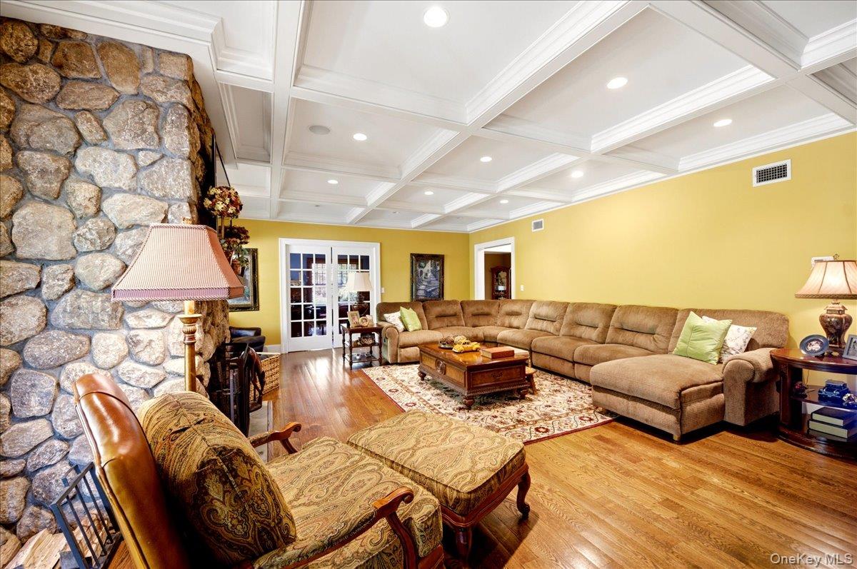 7 Ridgeview Circle Armonk, NY 10504 - Photo 11 of 50 a living room with furniture fireplace and a table