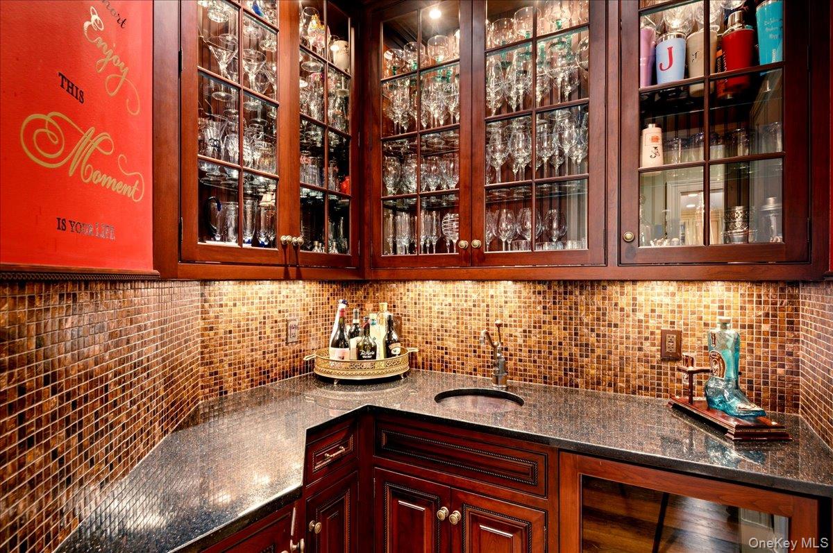 7 Ridgeview Circle Armonk, NY 10504 - Photo 14 of 50 a kitchen with a sink and cabinets