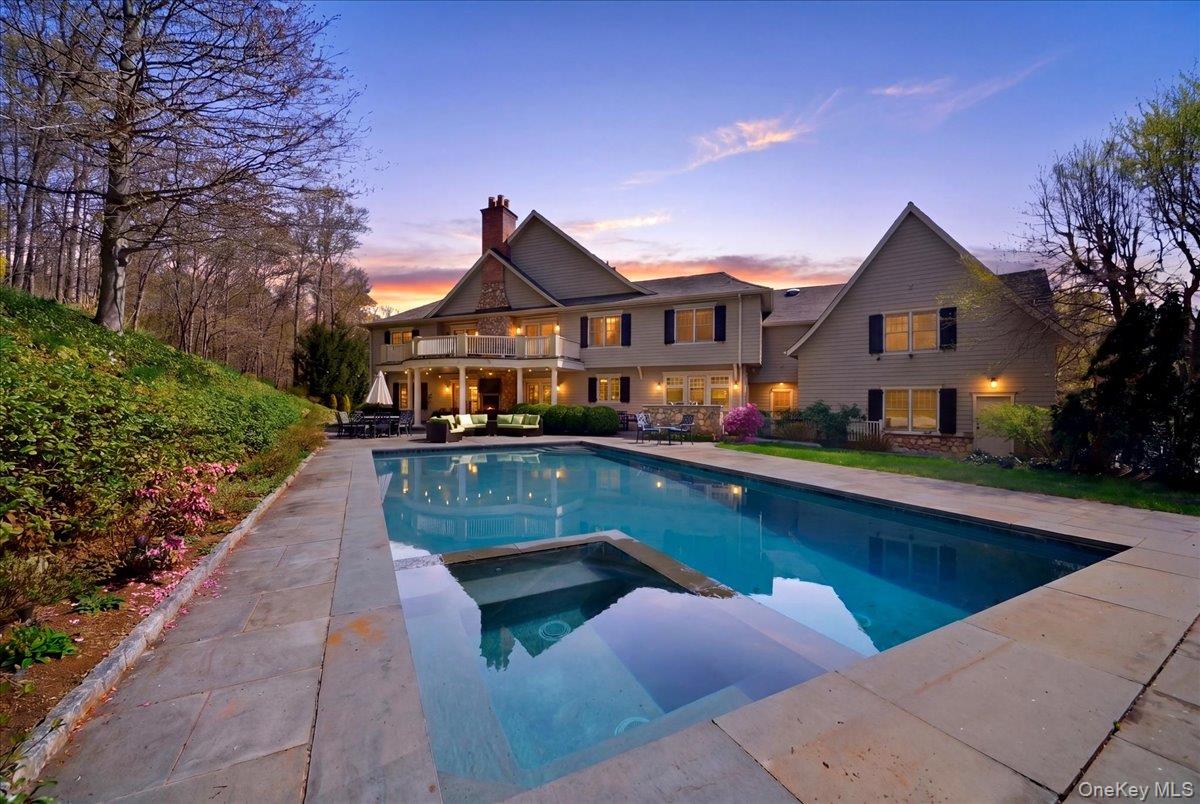 7 Ridgeview Circle Armonk, NY 10504 - Photo 2 of 50 a view of house with outdoor space and trees around