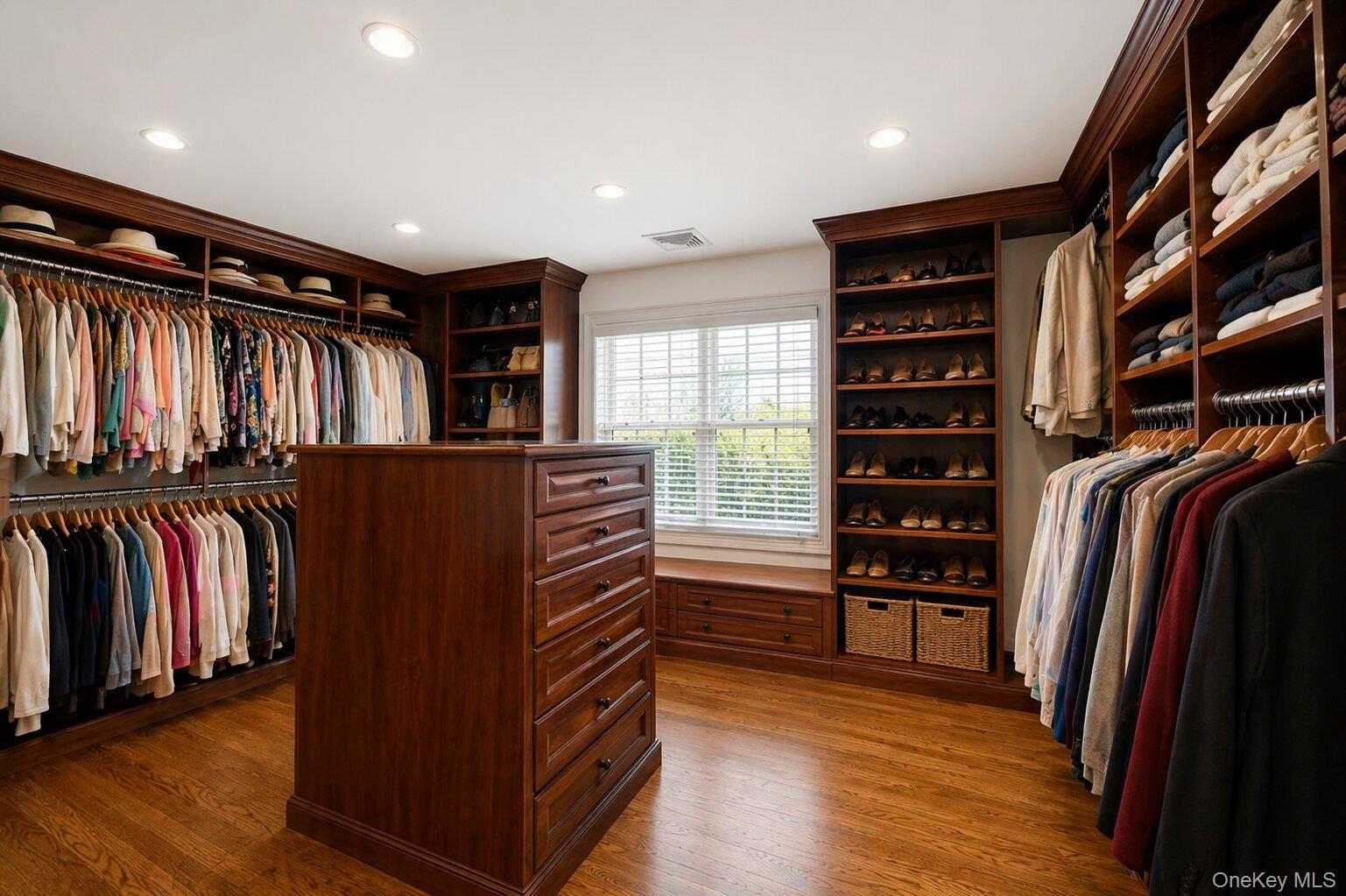 7 Ridgeview Circle Armonk, NY 10504 - Photo 24 of 50 a view of walk in closet with clothes and shoes