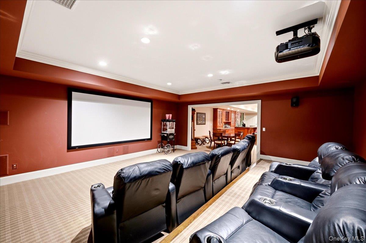 7 Ridgeview Circle Armonk, NY 10504 - Photo 36 of 50 a living room with furniture and large windows