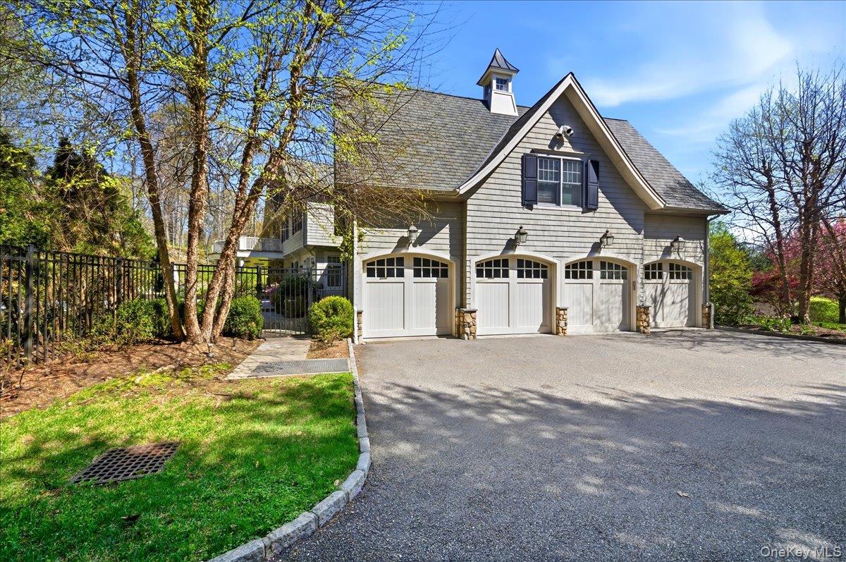 7 Ridgeview Circle Armonk, NY 10504 - Photo 44 of 50 a view of a house with a yard and pathway
