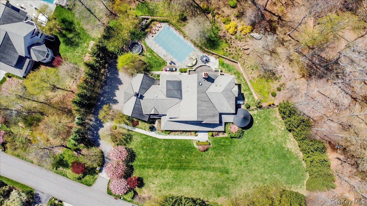 7 Ridgeview Circle Armonk, NY 10504 - Photo 47 of 50 an aerial view of residential house with outdoor space and swimming pool