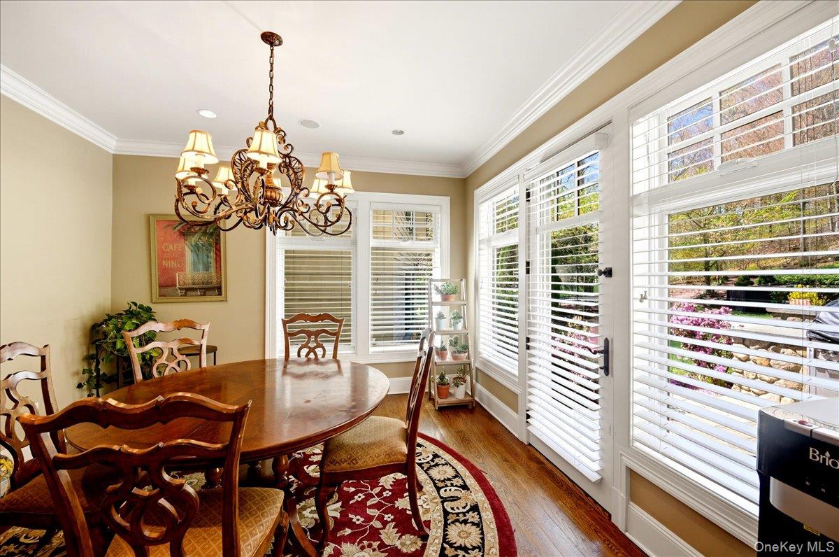 7 Ridgeview Circle Armonk, NY 10504 - Photo 8 of 50 a view of a dining room with furniture wooden floor and chandelier