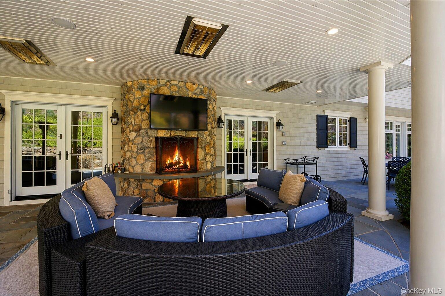 7 Ridgeview Circle Armonk, NY 10504 - Photo 10 of 50 a living room with fireplace furniture and a fireplace