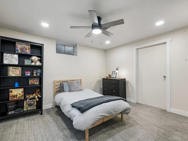 a view of a dining room with furniture and window