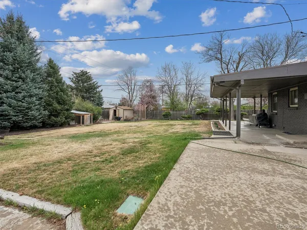 a view of street with parked cars