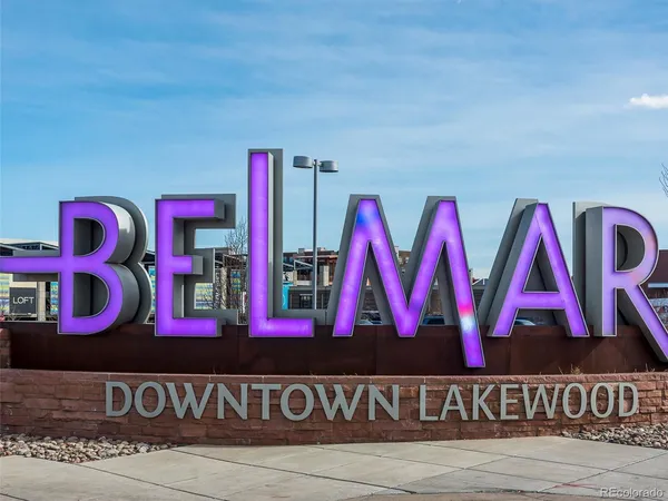 a view of a field with an ocean