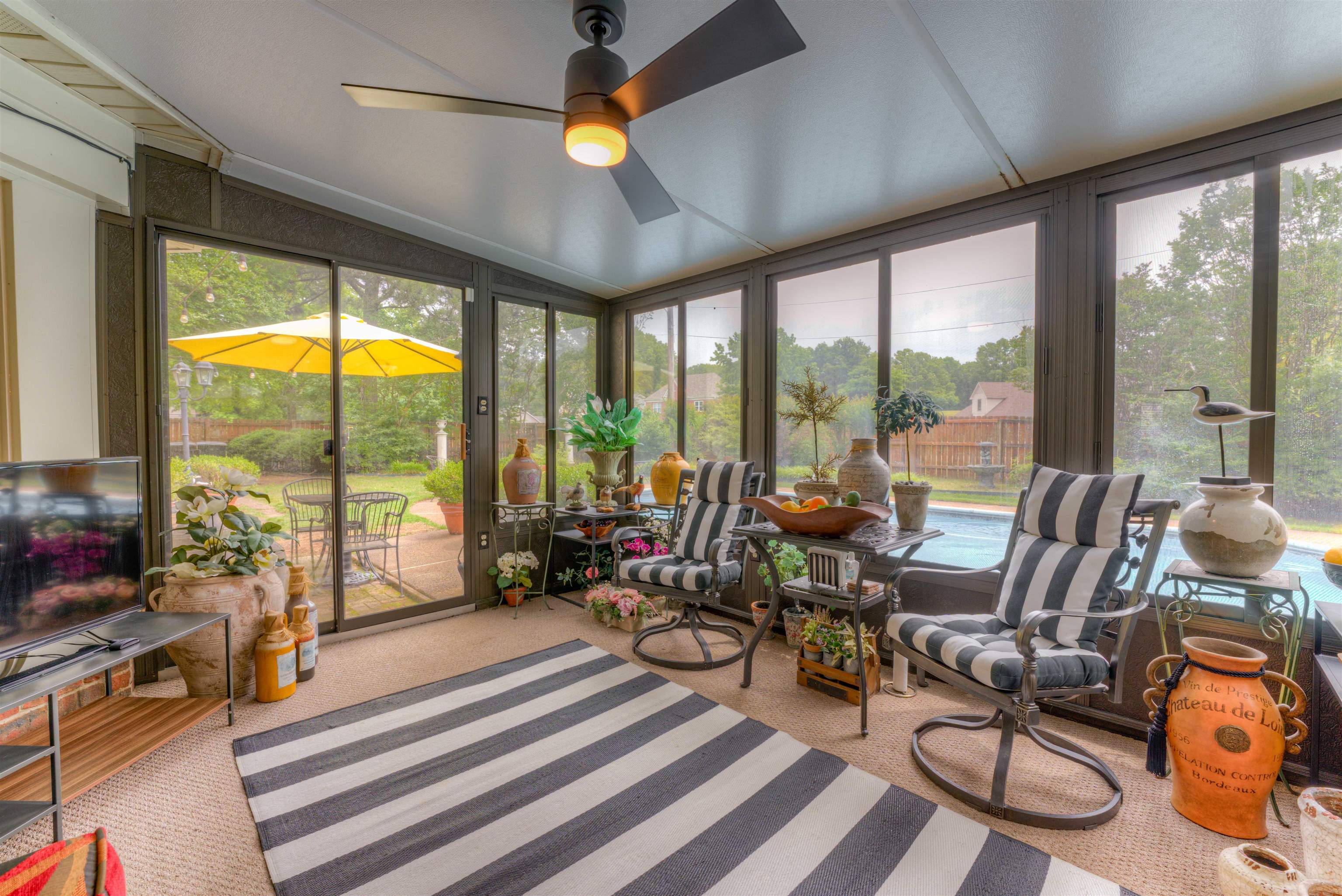 3930 Bobby Jones Road Memphis, TN 38125 - Photo 11 of 35 a view of a livingroom with furniture and floor to ceiling windows