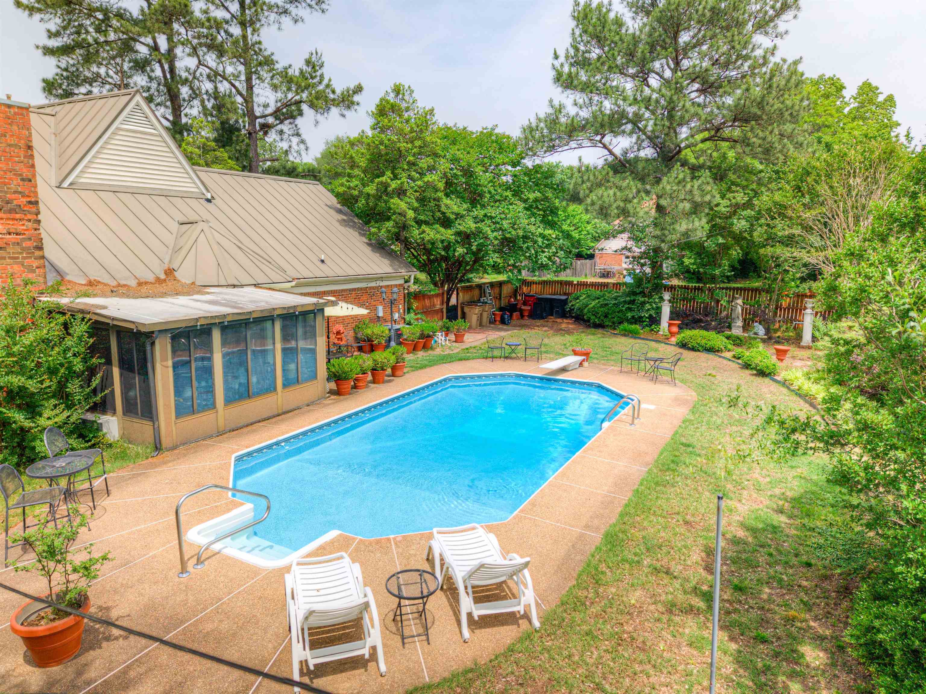 3930 Bobby Jones Road Memphis, TN 38125 - Photo 14 of 35 a view of a house with swimming pool
