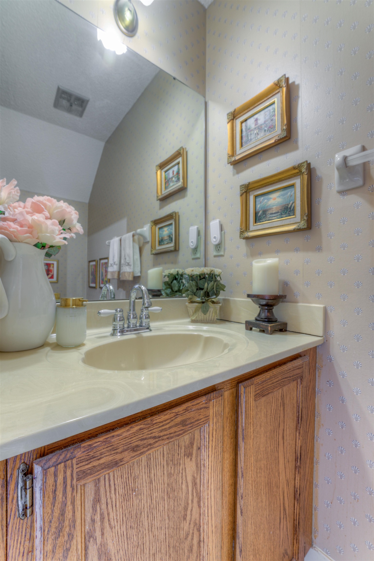 3930 Bobby Jones Road Memphis, TN 38125 - Photo 27 of 35 a bathroom with a sink and a mirror