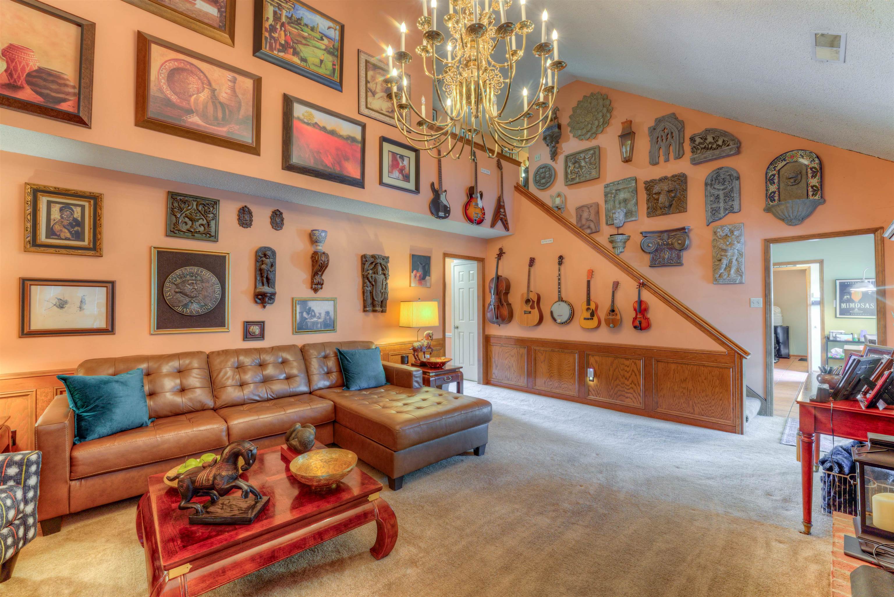 3930 Bobby Jones Road Memphis, TN 38125 - Photo 4 of 35 a reading room with furniture and a book shelf