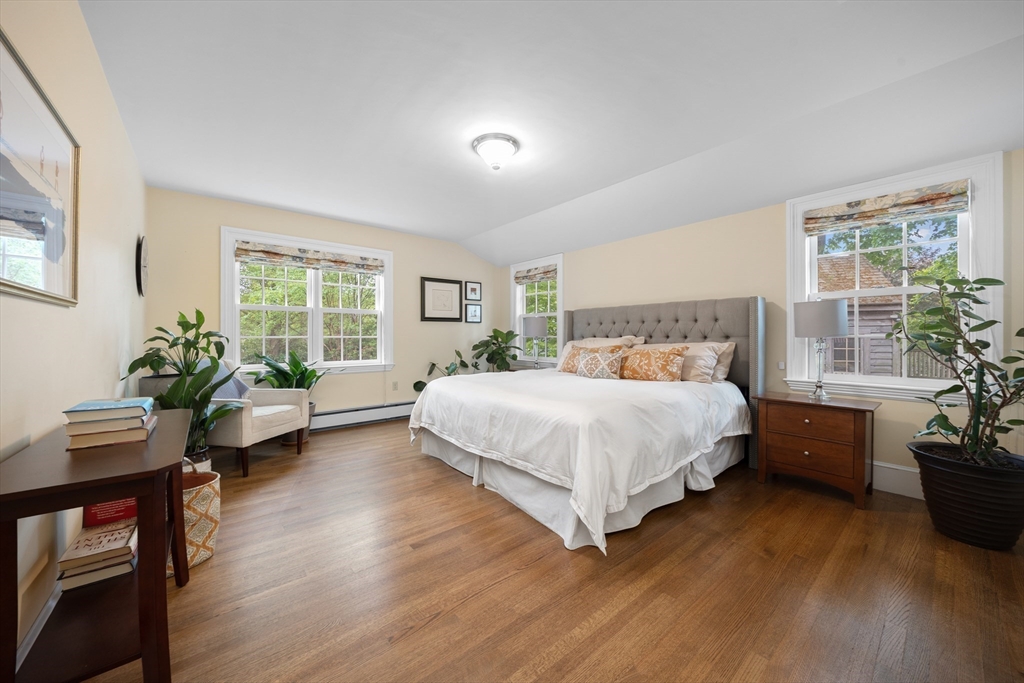 15 Hawthorne Road Hingham, MA 02043 - Photo 14 of 35 a bedroom with a bed table and windows