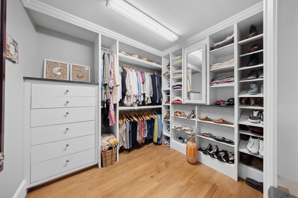 15 Hawthorne Road Hingham, MA 02043 - Photo 15 of 35 a view of walk in closet with clothes and shoes