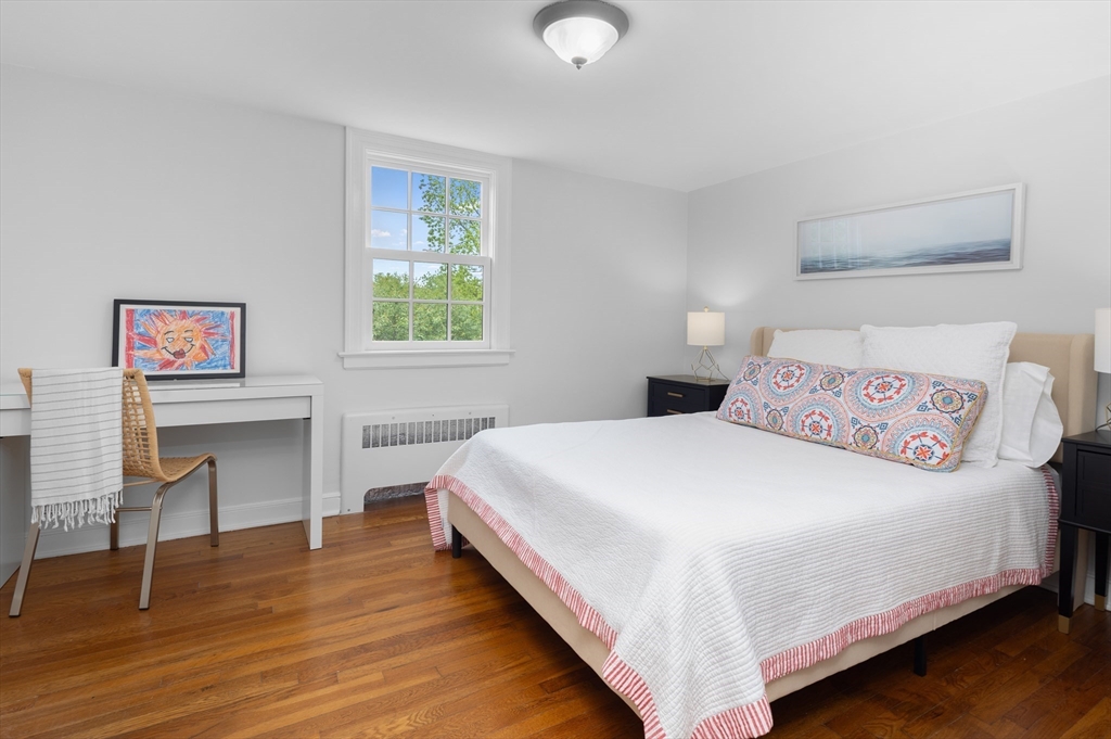 15 Hawthorne Road Hingham, MA 02043 - Photo 19 of 35 a bedroom with a bed and a desk