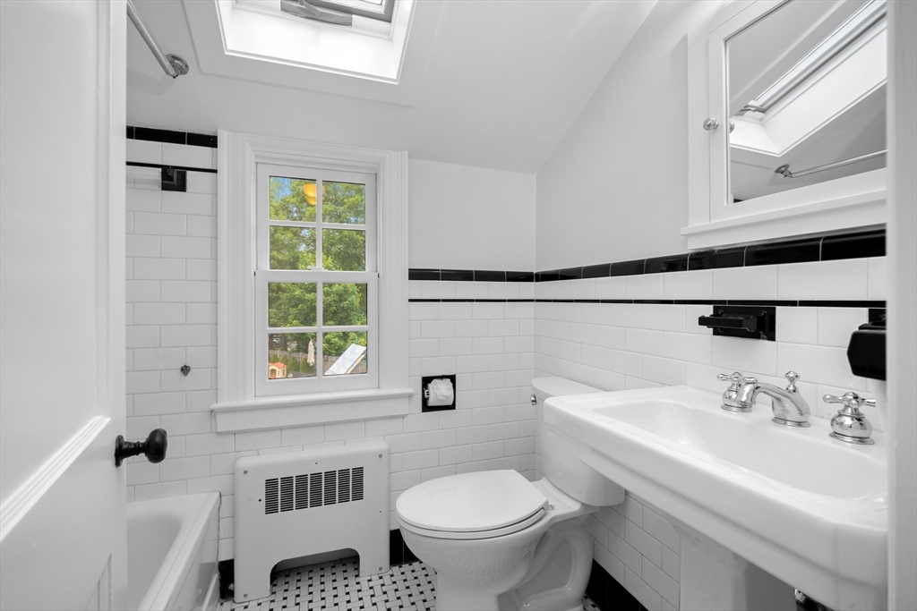 15 Hawthorne Road Hingham, MA 02043 - Photo 20 of 35 a bathroom with a sink toilet and a mirror