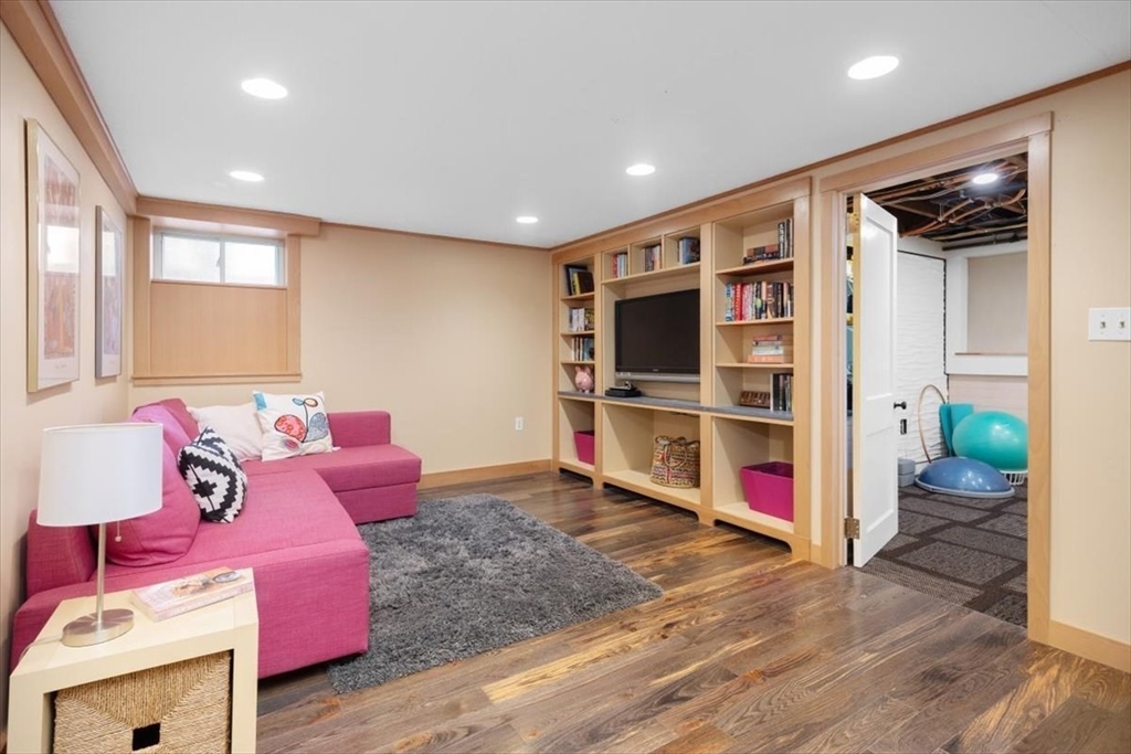 15 Hawthorne Road Hingham, MA 02043 - Photo 23 of 35 a bedroom with furniture and a flat screen tv