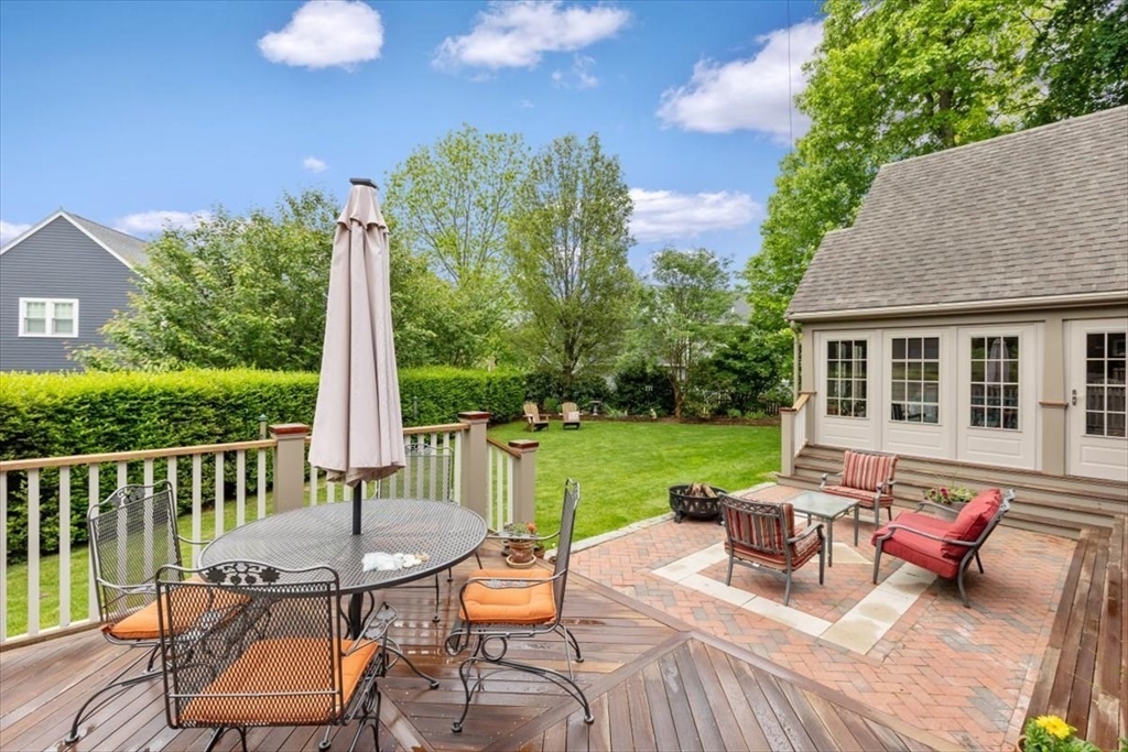 15 Hawthorne Road Hingham, MA 02043 - Photo 32 of 35 a view of a patio with a table chairs and a table