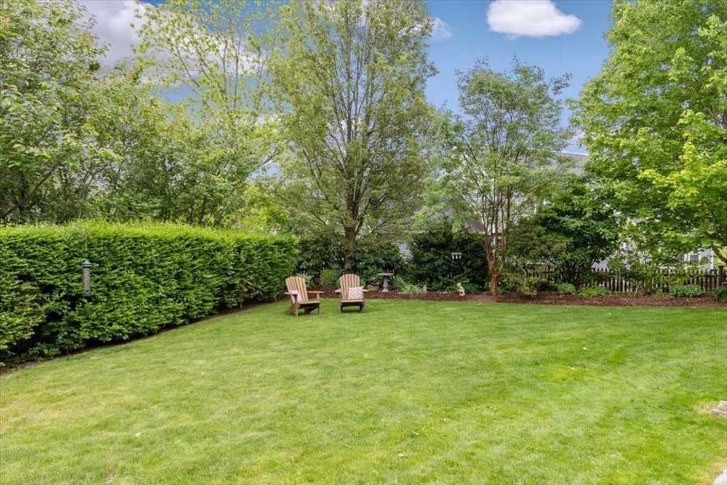 15 Hawthorne Road Hingham, MA 02043 - Photo 34 of 35 a view of a bench in the garden