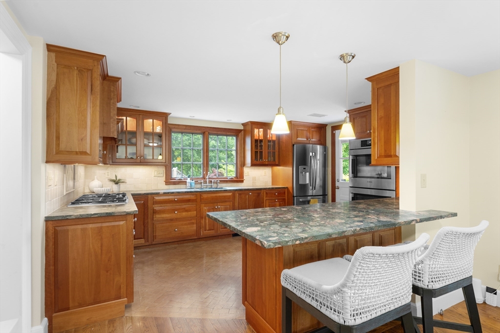 15 Hawthorne Road Hingham, MA 02043 - Photo 10 of 35 a view of a kitchen area kitchen island furniture and windows