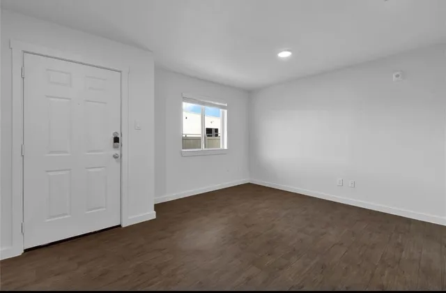 an empty room with windows