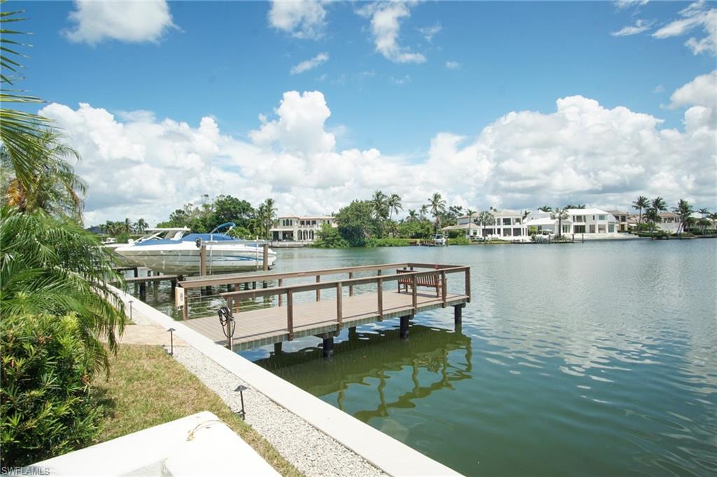 1900 Gulf Shore Boulevard North, Unit 602 Naples, FL 34102 - Photo 35 of 35 a view of a lake from a balcony