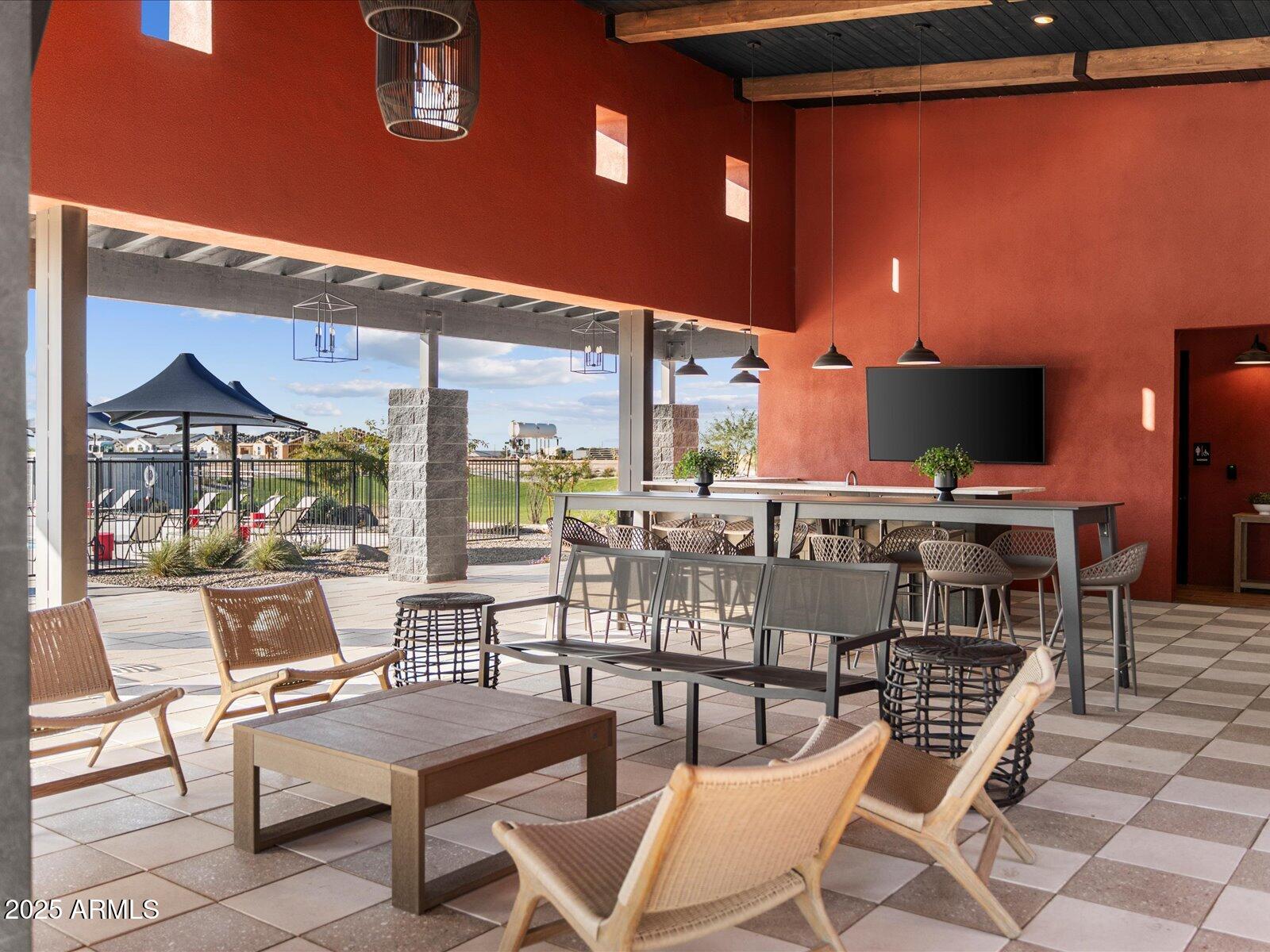 17586 West Monroe Street Goodyear, AZ 85338 - Photo 17 of 23 a view of a chairs and table in a patio