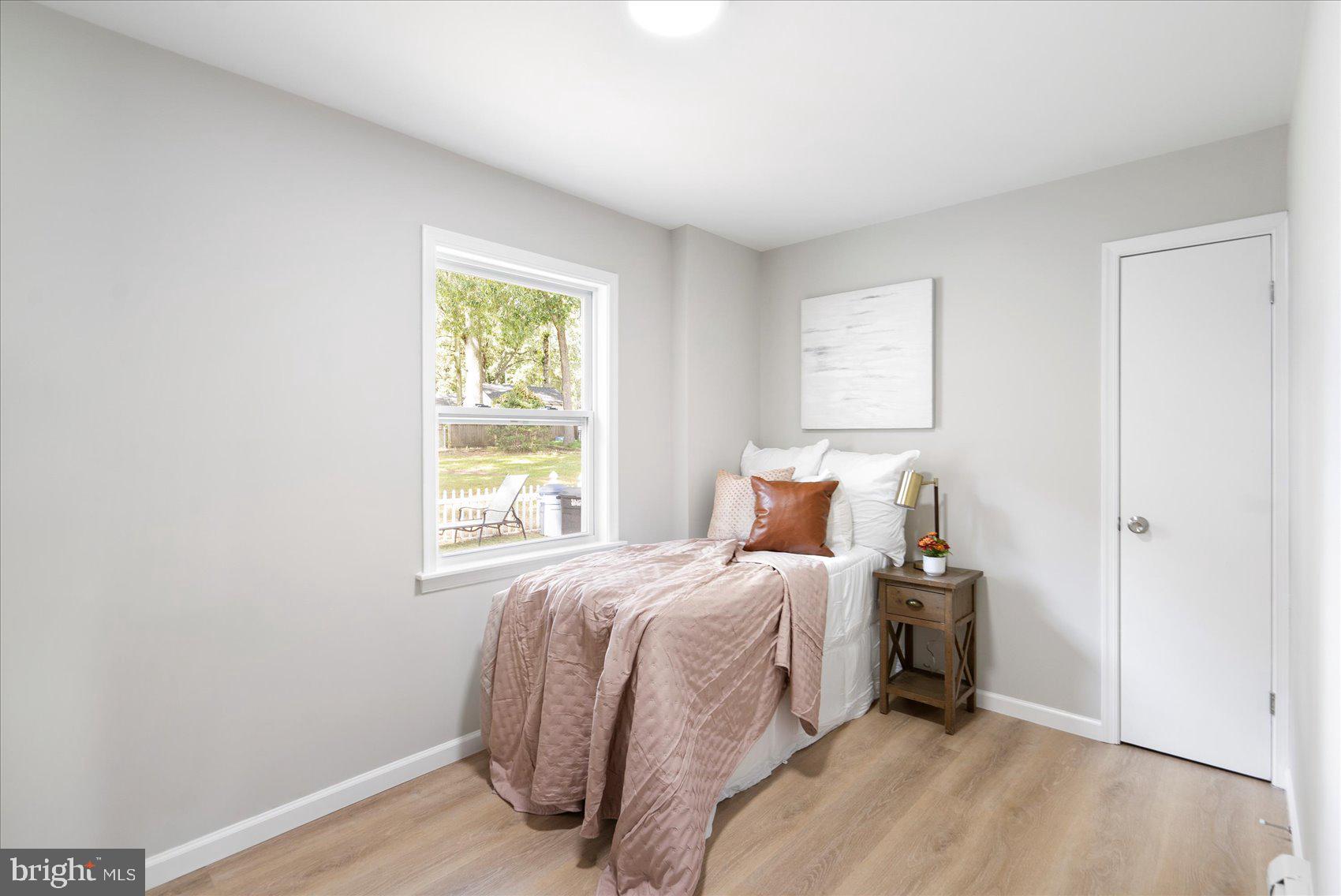 222 Magothy Road Pasadena, MD 21122 - Photo 19 of 30 a bedroom with a bed and a window