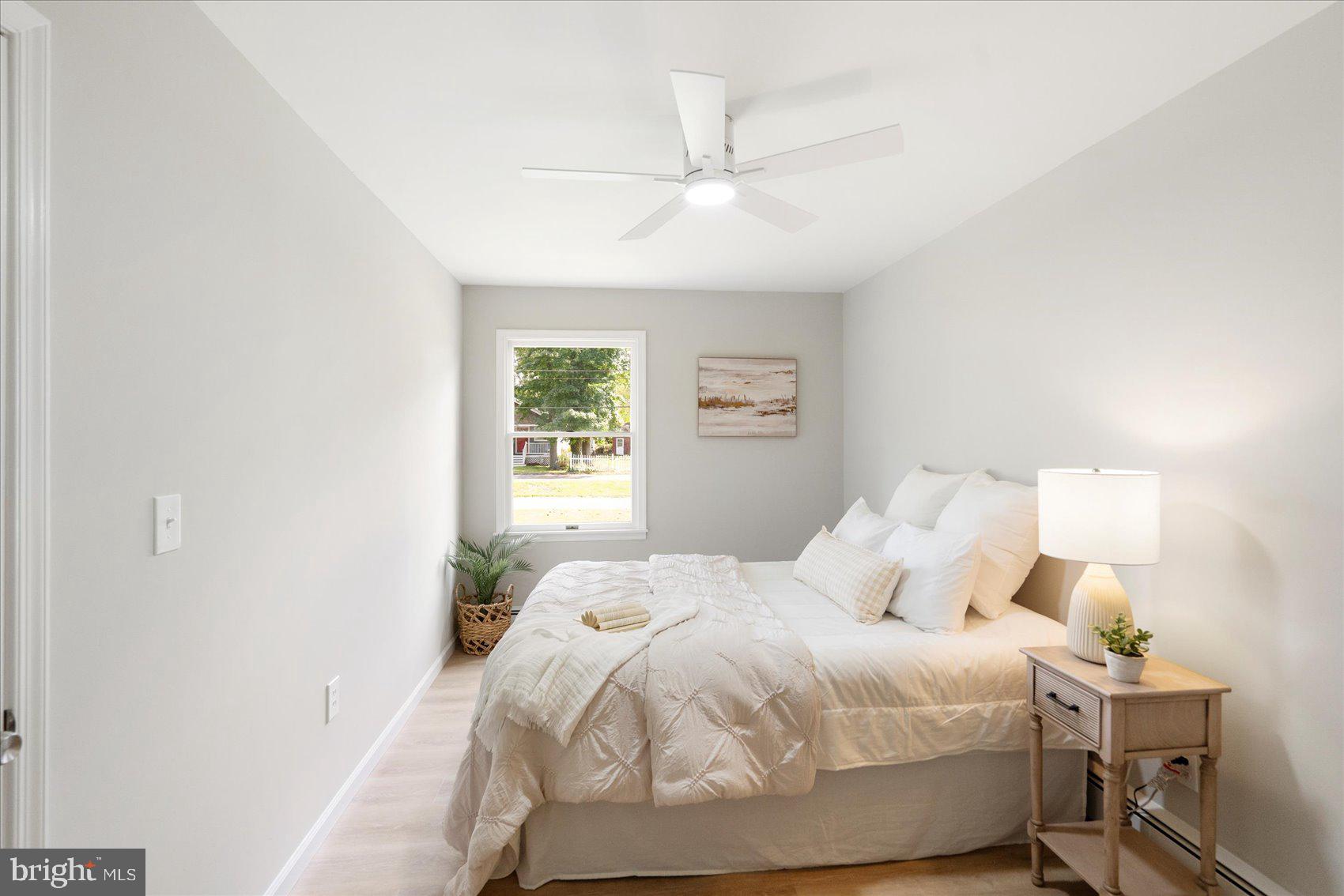 222 Magothy Road Pasadena, MD 21122 - Photo 20 of 30 a bedroom with a bed and a window