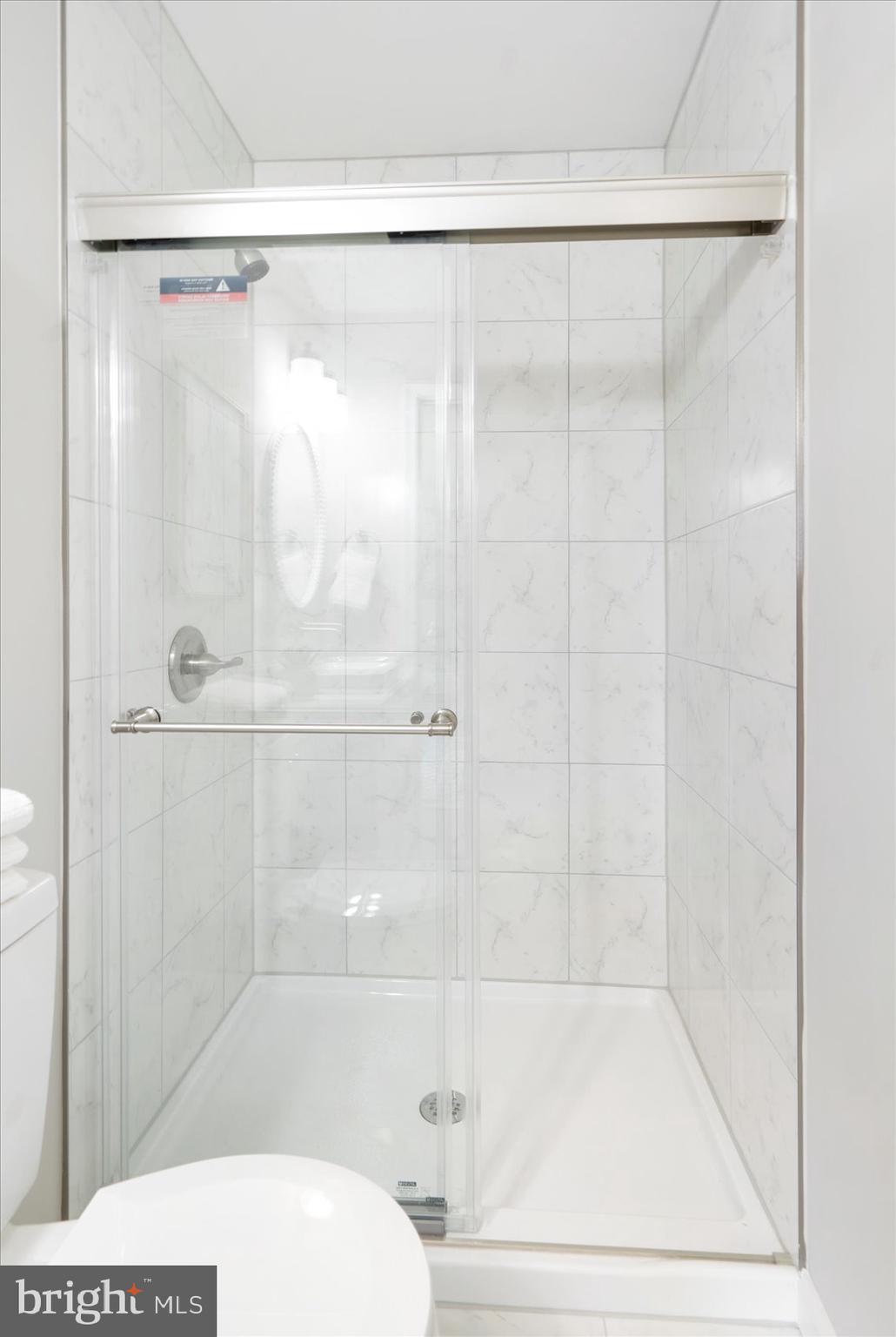 222 Magothy Road Pasadena, MD 21122 - Photo 25 of 30 a bathroom with a shower and a bathtub