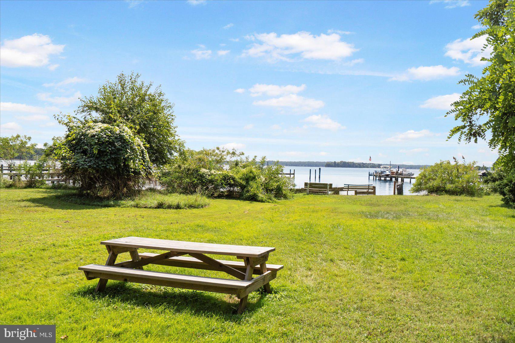 222 Magothy Road Pasadena, MD 21122 - Photo 30 of 30 a view of a lake with couches and city view