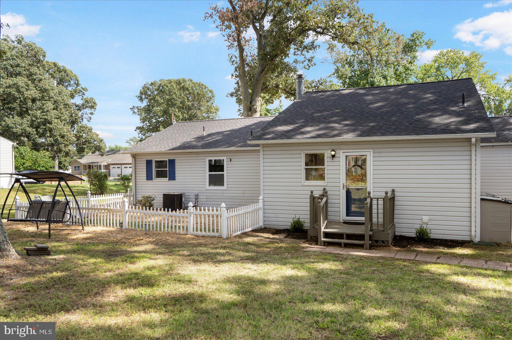 222 Magothy Road Pasadena, MD 21122 - Photo 7 of 30 a view of a house with a patio
