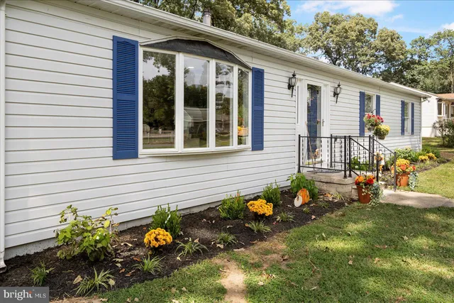 a front view of a house with patio
