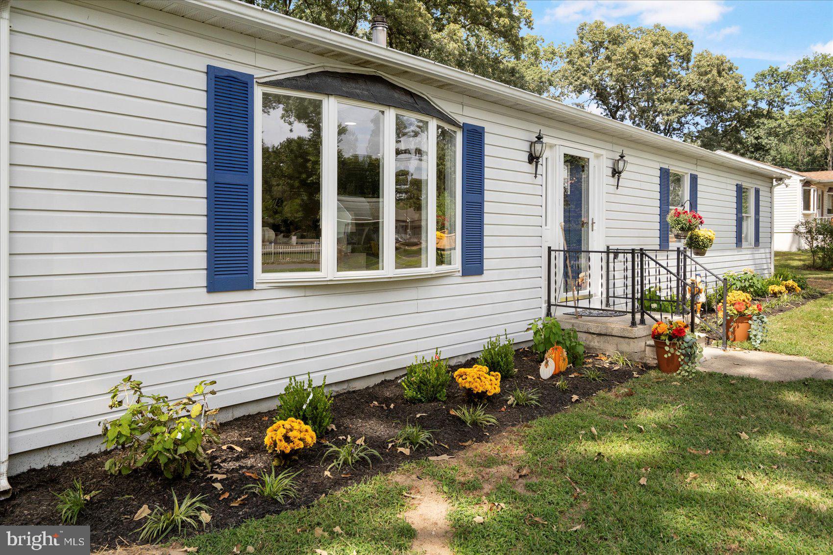 222 Magothy Road Pasadena, MD 21122 - Photo 8 of 30 a front view of a house with patio