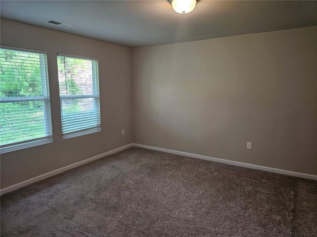 29 Danette Court Dallas, GA 30132 - Photo 8 of 14 an empty room with a window