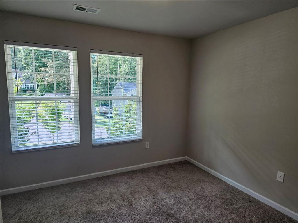 29 Danette Court Dallas, GA 30132 - Photo 10 of 14 an empty room with a window