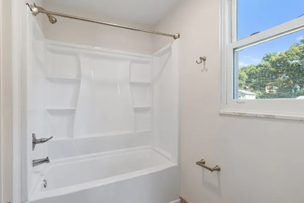 a bathroom with a bathtub