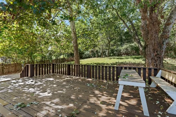 a view of a house with a yard and garage