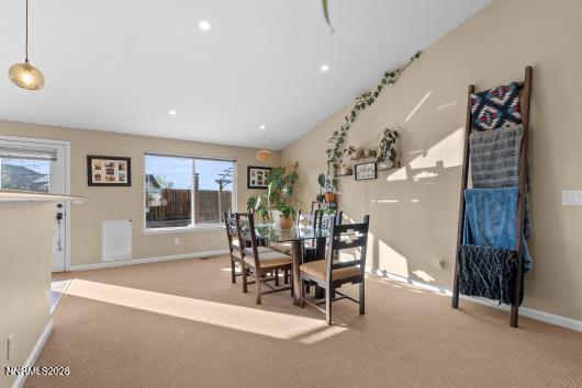 552 Spur Court Fernley, NV 89408 - Photo 12 of 46 a dining room with furniture and entryway