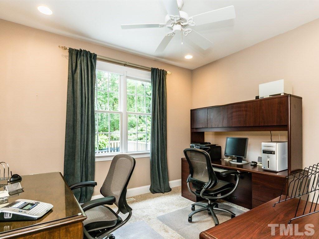 6304 Pleasant Creek Court Raleigh, NC 27613 - Photo 19 of 25 a workspace with furniture and a window