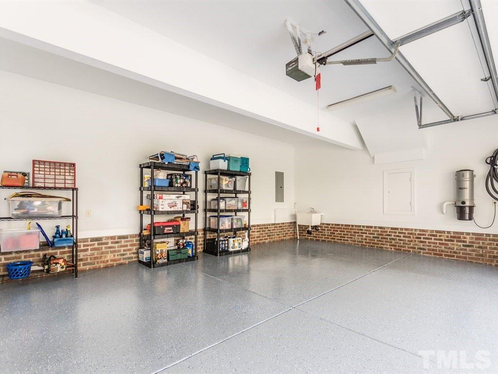 6304 Pleasant Creek Court Raleigh, NC 27613 - Photo 22 of 25 a view of a room with gym equipment